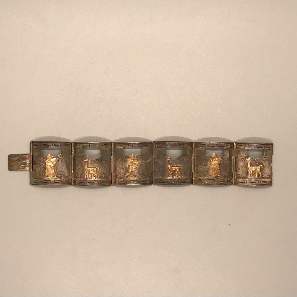 Vintage MCM Peru Sterling and 18k gold bracelet. Looks worlds better than pics.